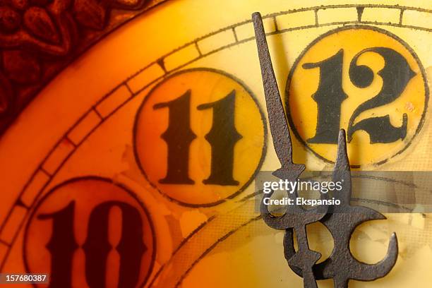 clock at almost twelve midnight on new years eve - grandfather clock stock pictures, royalty-free photos & images