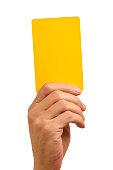 Hand holding bright yellow card against white background