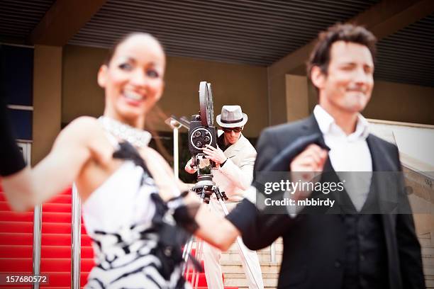 celebrity couple on red carpet in cannes - evening wear stock pictures, royalty-free photos & images
