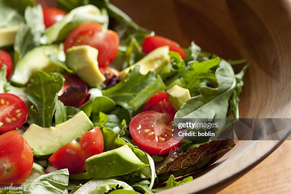 Fresh salad with cherry tomatoes, avocado and mixed greens
