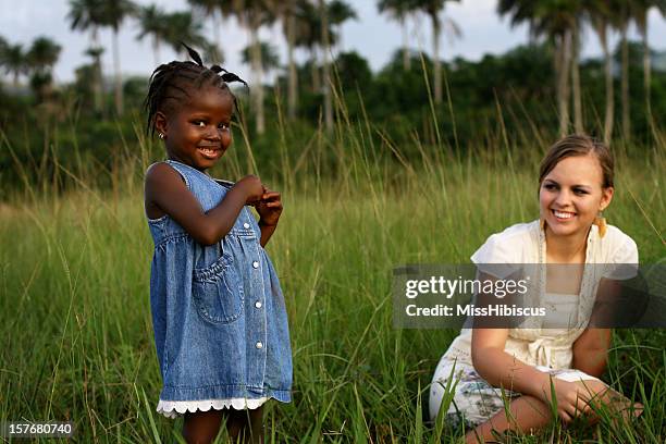 african girl with american woman - miss sierra leone stock pictures, royalty-free photos & images
