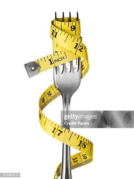 tape measure on a fork - tape measure stock pictures, royalty-free photos & images