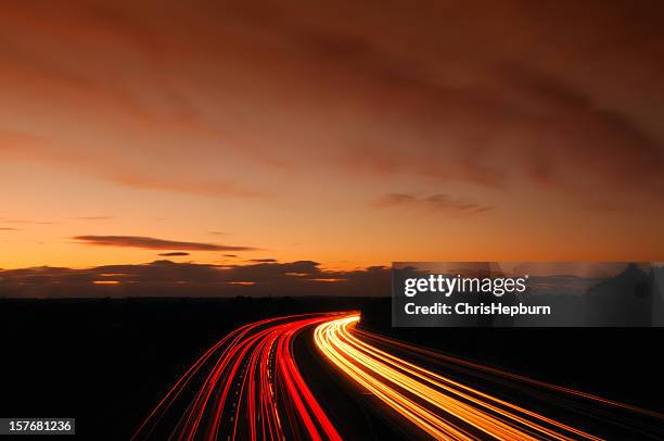 motorway sunset - lights long exposure stock pictures, royalty-free photos & images