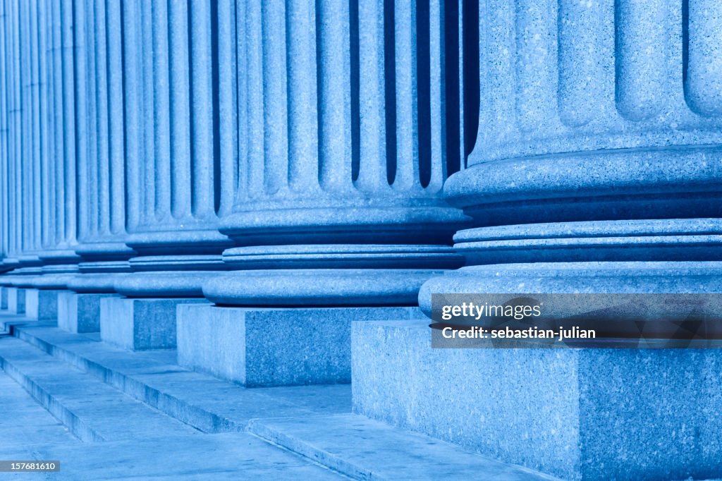 Group of corporate blue business columns with steps