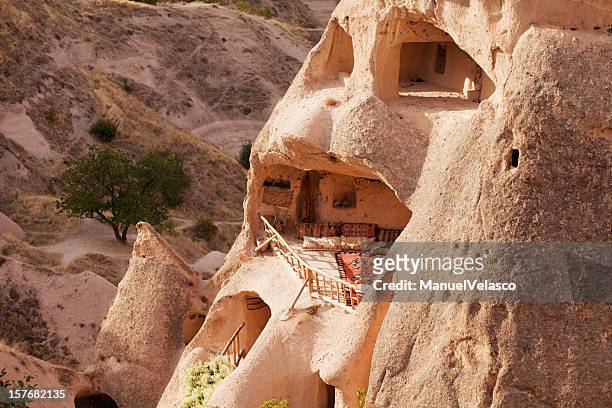 living room in a turkish cave - cappadocia stock pictures, royalty-free photos & images