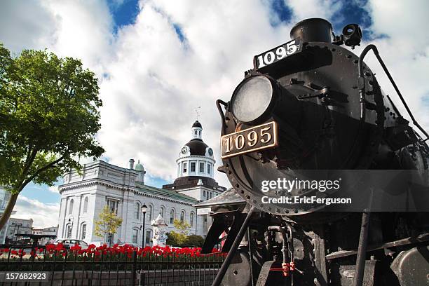 kingston downtown with tulips and train - kingston stockfoto's en -beelden