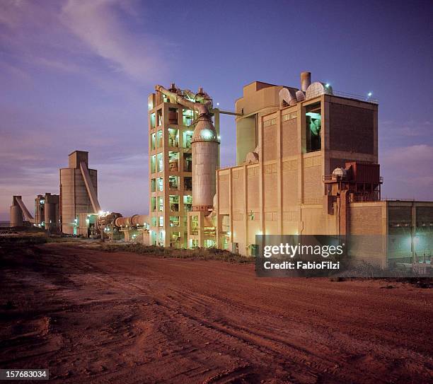 cement plant at sunset - fabio filzi stock pictures, royalty-free photos & images