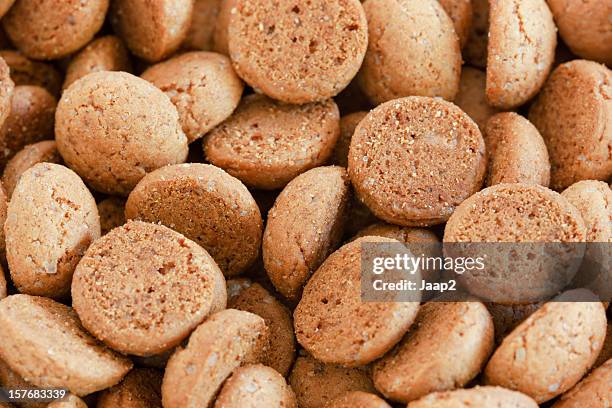 pile of pepernoten candy, traditional dutch treat around "sinterklaas" - pepernoten stock pictures, royalty-free photos & images