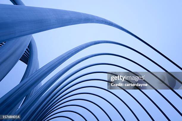 abstract metal pipes and tubes sculpture madrid, spain - architectural feature stock pictures, royalty-free photos & images