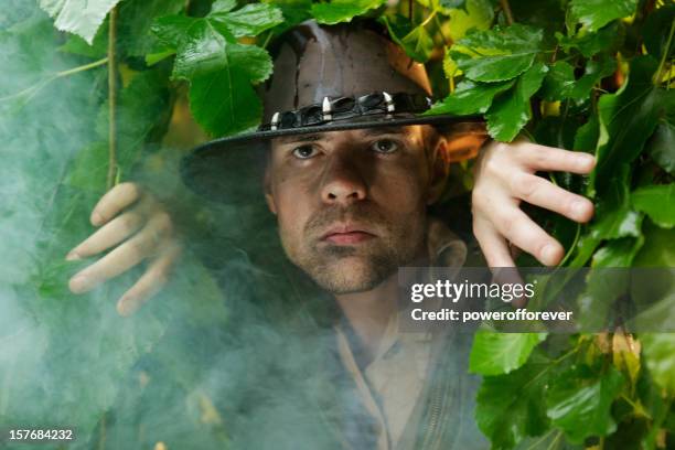 adventurer - emerging from ground stock pictures, royalty-free photos & images