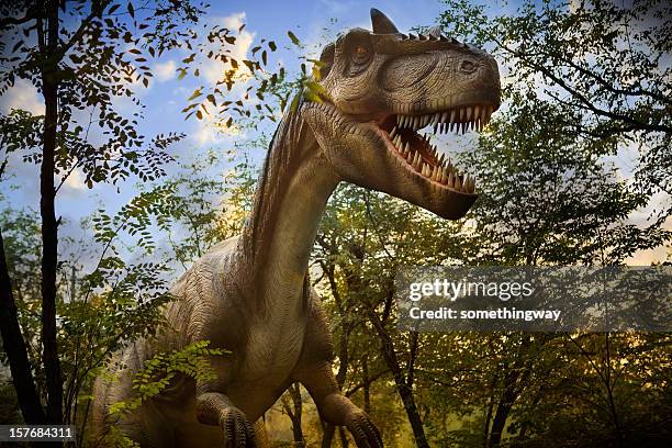 model of a dinosaur park - tyrannosaurus rex stock pictures, royalty-free photos & images