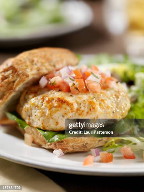 turkey burger with spinach and salsa - turkey burger stock pictures, royalty-free photos & images
