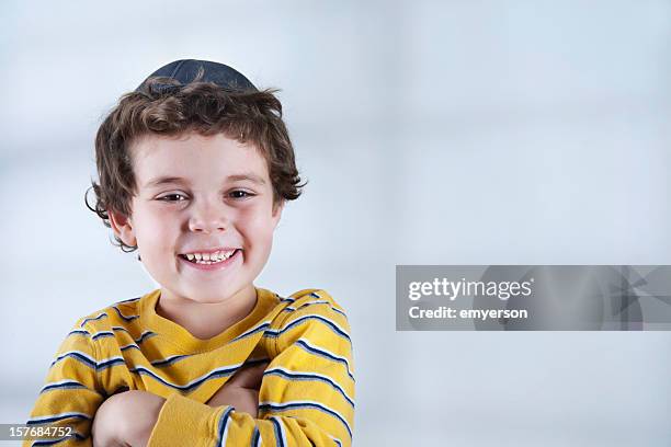 smiling jewish boy in striped yellow shirt - yarmulke stock pictures, royalty-free photos & images