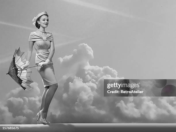 unter freiem himmel. - woman 1950 stock-fotos und bilder
