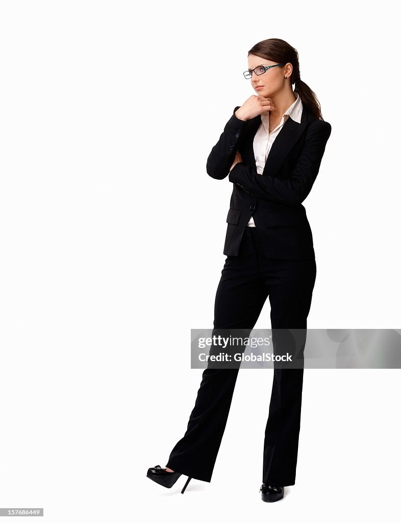 Woman in a business suit with hand on chin