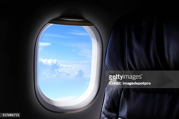 airplane window - airplane open door stockfoto's en -beelden