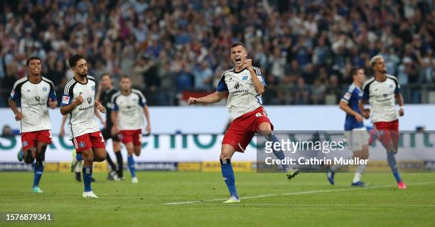 Laszlo Benes of Hamburger SV celebrates after scoring the team's second goal due a penalty during the Second Bundesliga match between Hamburger SV...