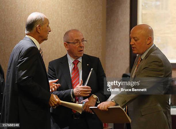 Jeremy Jacobs of the Boston Bruins, Larry Tanenbaum of the Toronto Maple Leafs and Bill Daly of the NHL discuss negotiations at the Westin Times...