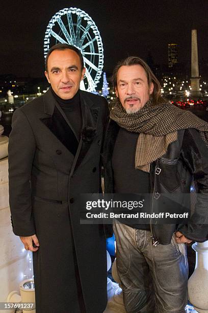 Television show host Nikos Aliagas and singer Florent Pagny attend the shooting of the year end program "Toute la musique qu'on aime !" set to be...