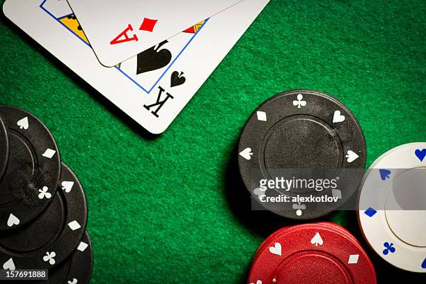 poker table with gambling chips and two cards from above - blackjack bildbanksfoton och bilder