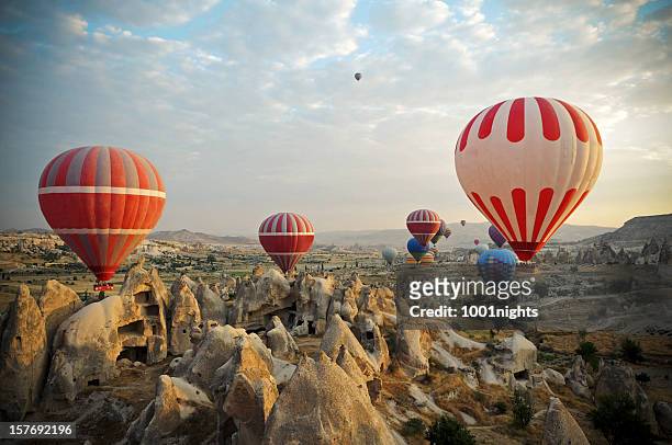 hot air ballons of cappadocia - cappadocia hot air balloon stock pictures, royalty-free photos & images