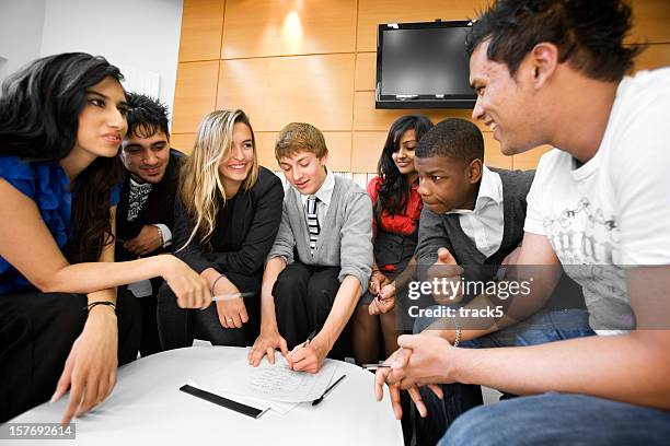 further education: teenage teamwork - students arguing stock pictures, royalty-free photos & images