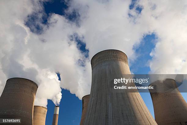 cooling towers at a coal fueled power station. - chimney stock pictures, royalty-free photos & images