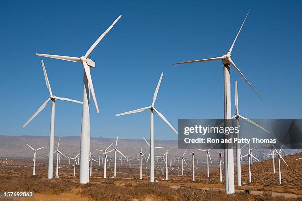 white wind turbines near palm springs, california - wind turbine california stock pictures, royalty-free photos & images