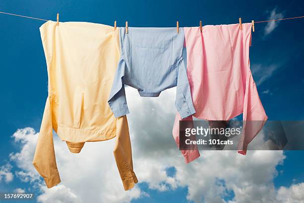 fresh laundry - clothesline stockfoto's en -beelden