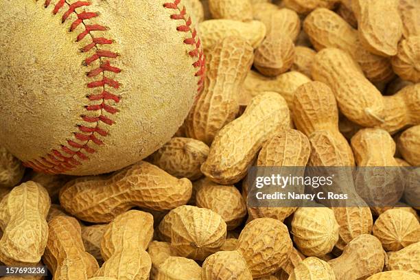 baseball und erdnüssen, ein all-american-kombination, saison - peanuts field stock-fotos und bilder
