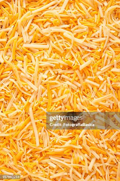 mixed grated cheeses - grated stock pictures, royalty-free photos & images