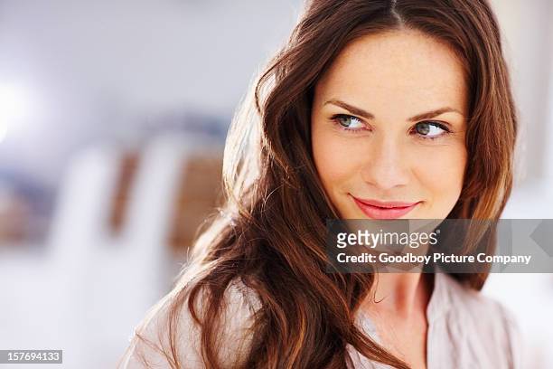 happy middle aged woman looking away - mid adult women stock pictures, royalty-free photos & images