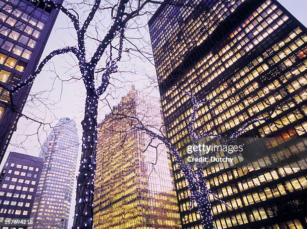 office buildings with christmas decoration in front. - toronto winter stock pictures, royalty-free photos & images