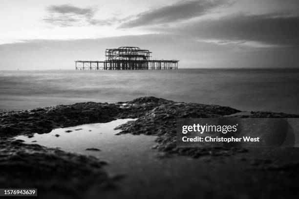 greyscale brighton beach - kingdom of england stock pictures, royalty-free photos & images