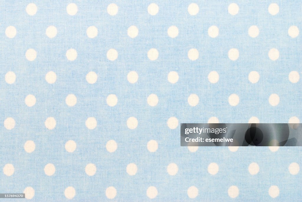 White polka dots on blue