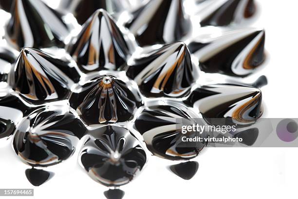 ferrofluid close-up - ferro metal stock pictures, royalty-free photos & images