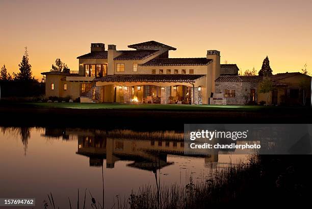 adobe home was taken at twilight - adobe stock pictures, royalty-free photos & images