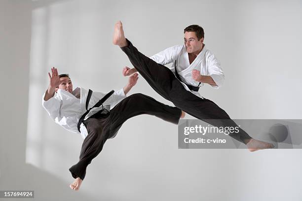 two tae kwon do fighter - akido stock pictures, royalty-free photos & images