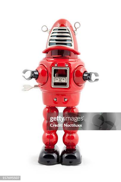robot jouet en métal rouge - red robot toy photos et images de collection