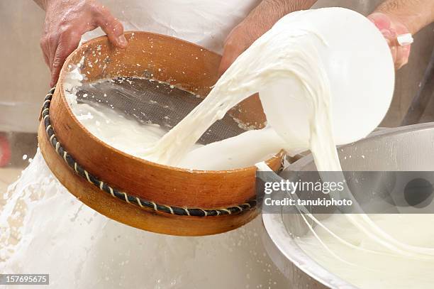 making mozzarella cheese - mozzarella stock pictures, royalty-free photos & images