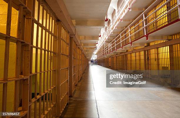 interior of a prison cell in a state penitentiary - heritage hall stock pictures, royalty-free photos & images