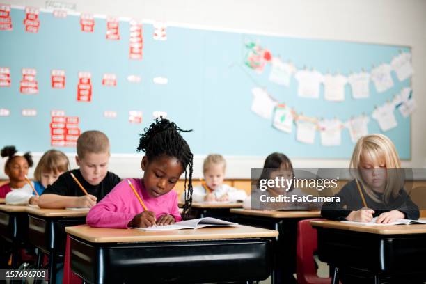 school kids - classroom desk stock pictures, royalty-free photos & images