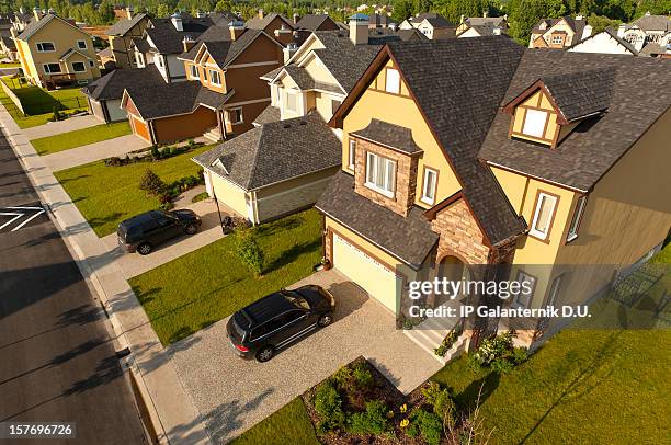 high angle view of suburban houses and cars - driveway stock pictures, royalty-free photos & images