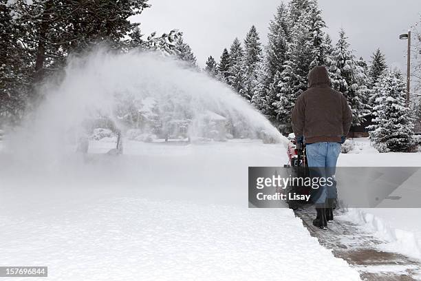clearing the driveway - snow blower stock pictures, royalty-free photos & images