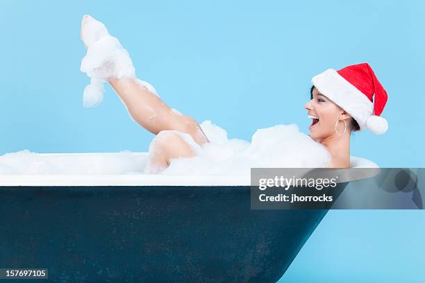 baden miss santa - bad christmas stock-fotos und bilder