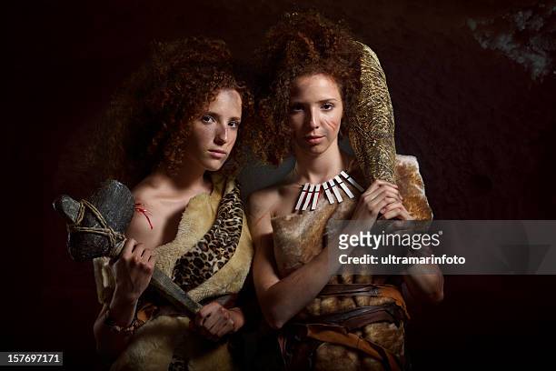 twin sisters - stone age stock-fotos und bilder