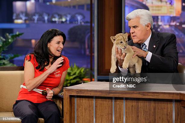 Episode 4366 -- Pictured: Animal Expert Julia Scardina and a baby lion during an interview with host Jay Leno on December 5, 2012 --