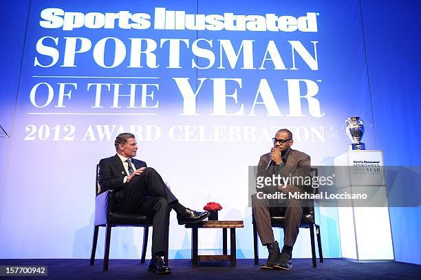 Sportscaster Dan Patrick and 2012 Sportsman of the Year LeBron James speak onstage the 2012 Sports Illustrated Sportsman of the Year award...
