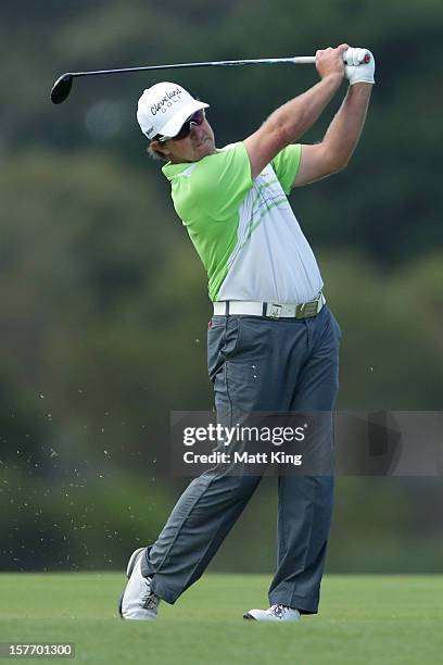 Scott Laycock of Australia plays a shot on the fairway during the first round of the 2012 Australian Open at The Lakes Golf Club on December 6, 2012...