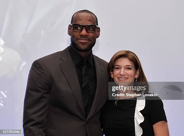 Sportsman of the Year LeBron James and CEO of Time Inc. Laura Lang attend the 2012 Sports Illustrated Sportsman of the Year award presentation at...